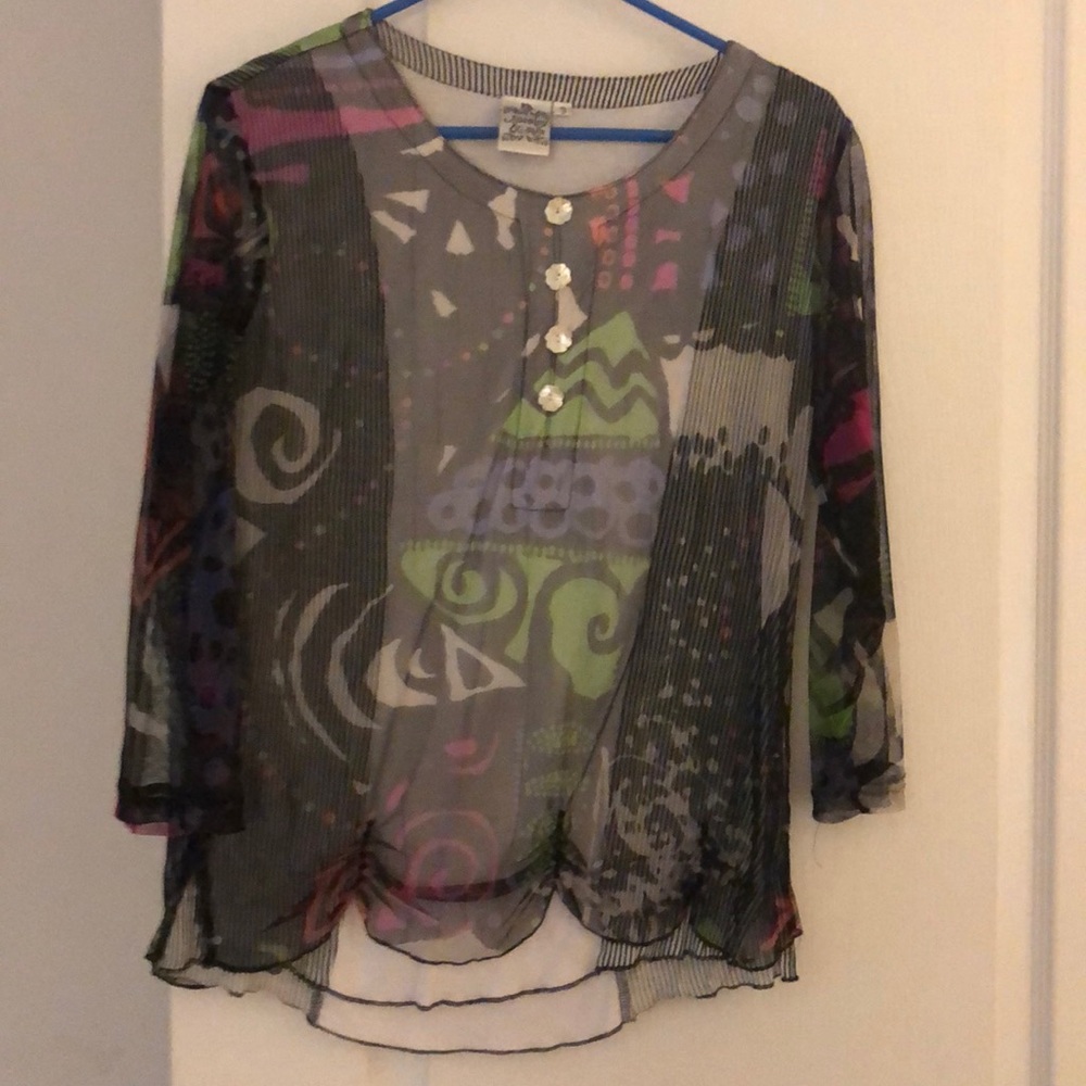 Cute and funky Boho top for jeans.